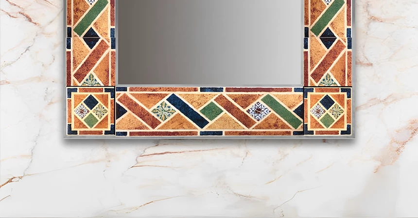 A colorful Mediterranean frame in a mirror is installed on a porcelain wall.