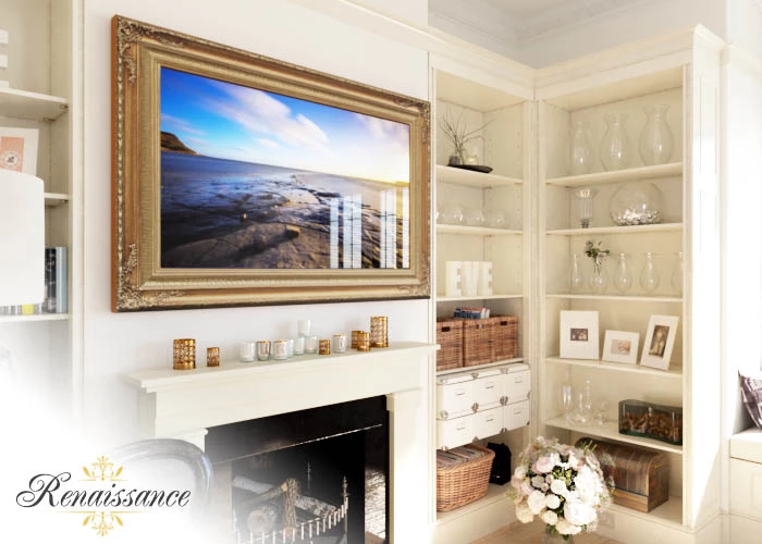 A framed mirror TV is installed on a white wall above a fireplace with shelves on the side.
